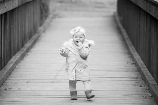 Baby girl walking by Erika's Way Photography