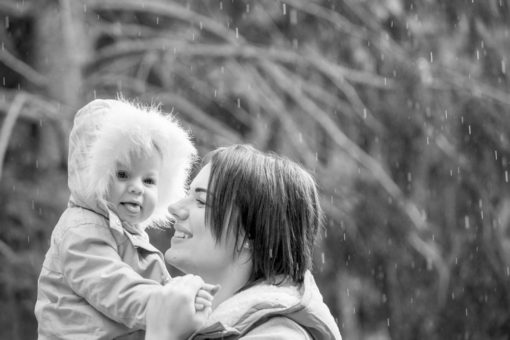 Mum and Daughter playing in the rain at Emerald Lake Park, Emerald, Vic. Copyright Erika's Way Photography